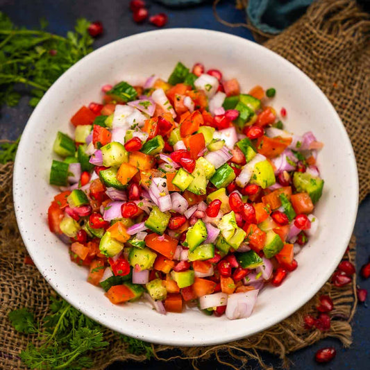 CUCUMBER, TOMATO, AND ONION SALAD.